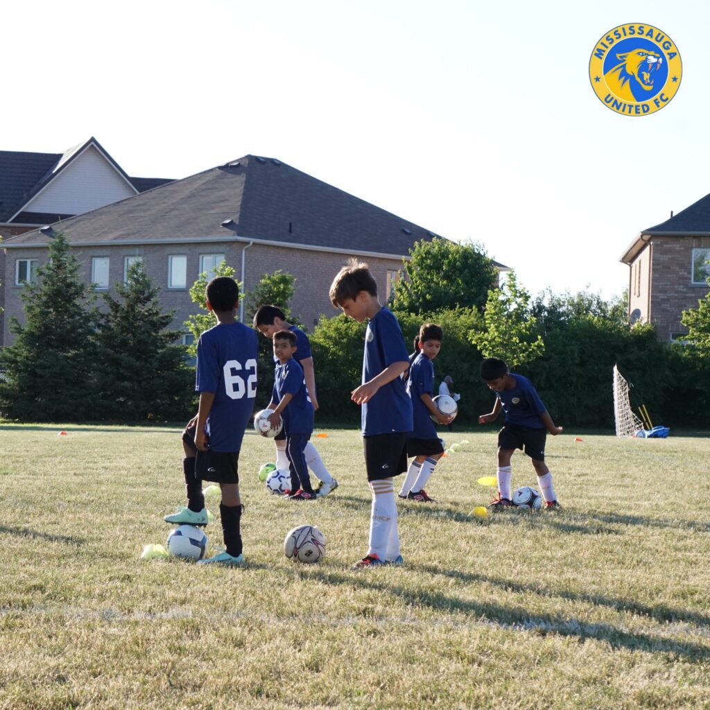 Kids playing competitive soccer during the All-Star Program at Mississauga United FC