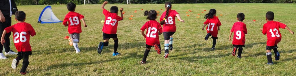 Young children learning soccer in the Future Stars Program at Mississauga United FC