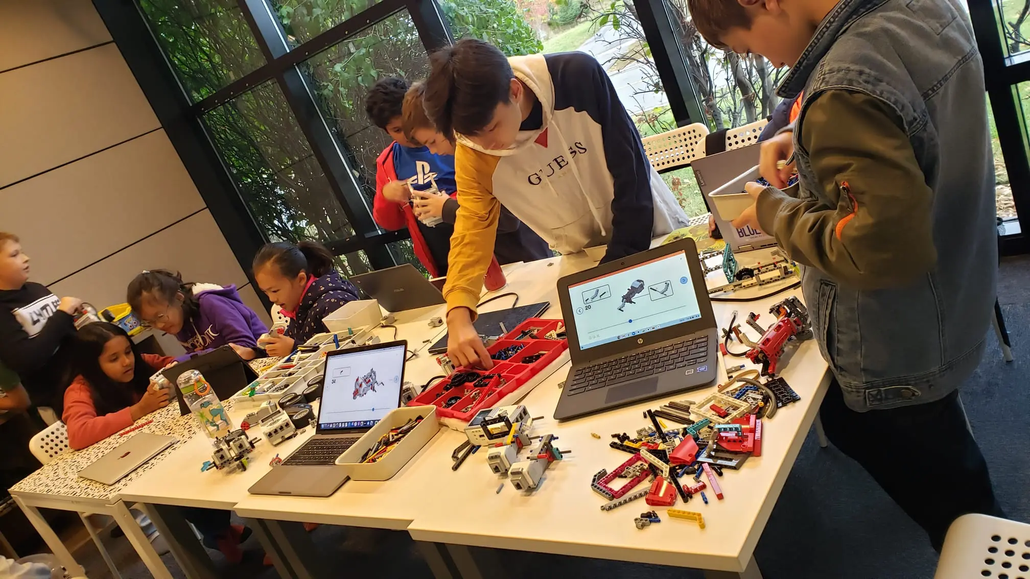 Kids coding and building robots at a youth robotics camp in Mississauga